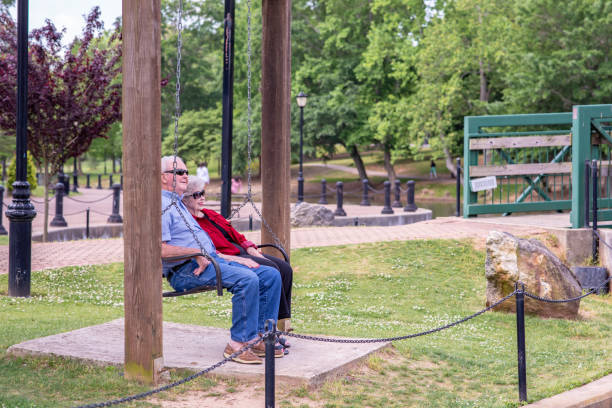 Senior couple sitting on a park bench