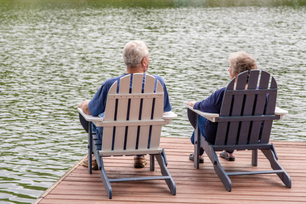 istock Senior couple overlooking a lake 1153466368