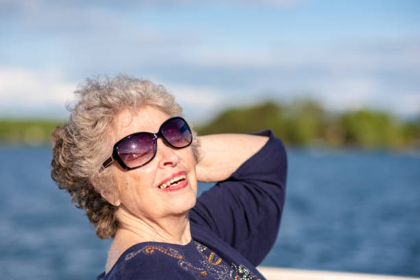 istock Glamorous senior woman on vacation 1153466417