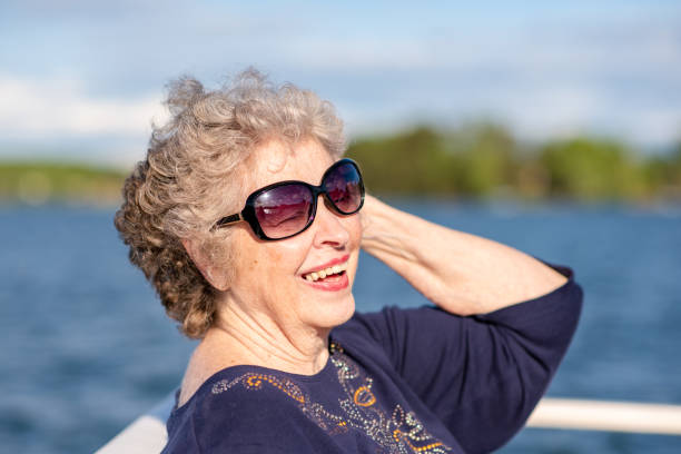 istock Glamorous senior woman on vacation 1153466423