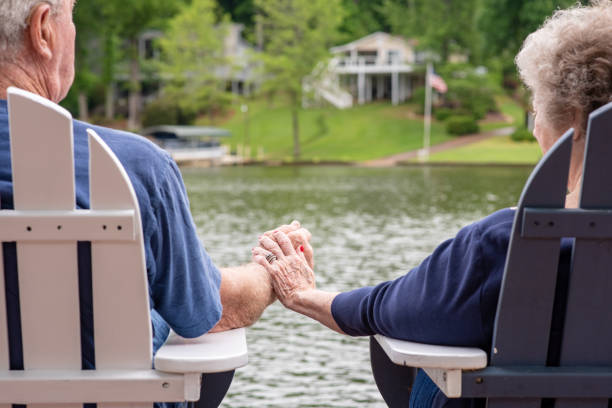 istock Senior couple holding hands 1153466548