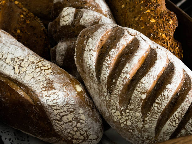 istock Different kinds of breads on from above. Kitchen or bakery poster design 1153467530