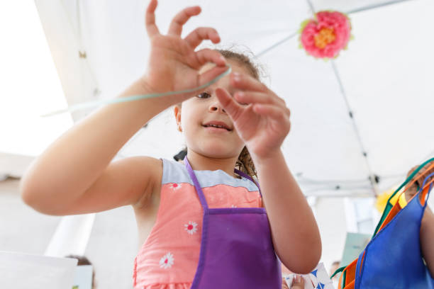 istock Children learning to paint in community activity 1153467933