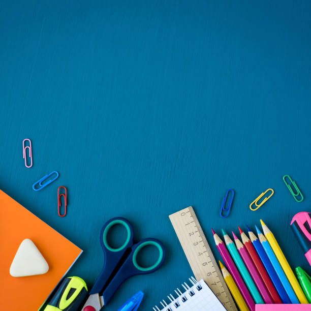 istock School supplies on blue background 1153471074