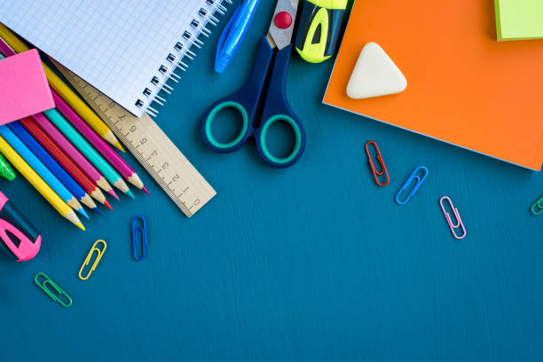 istock School supplies on blue background 1153471076