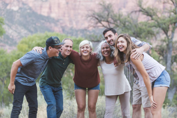 istock Multi-generational of friends posing together outside 1153475852