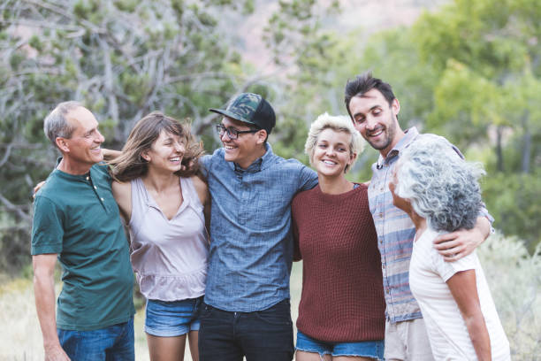 istock Multi-generational of friends posing together outside 1153475864