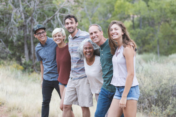 istock Multi-generational of friends posing together outside 1153475866