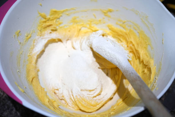 istock Close up of cake mix in a bowl 1153476332