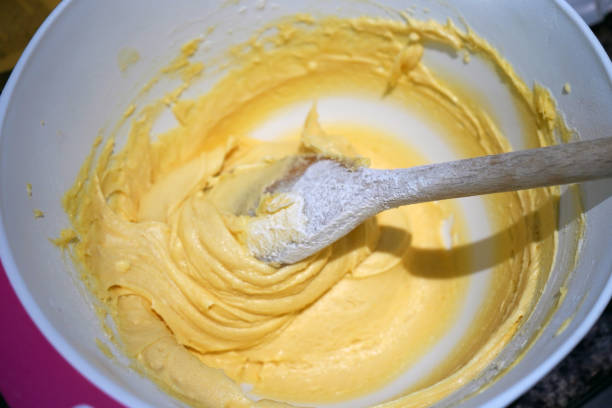 istock Close up of cake mix in a bowl 1153476495