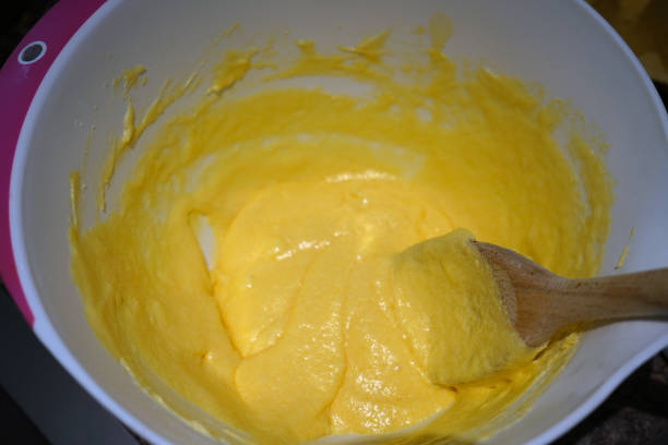 istock Close up of cake mix in a bowl 1153477562