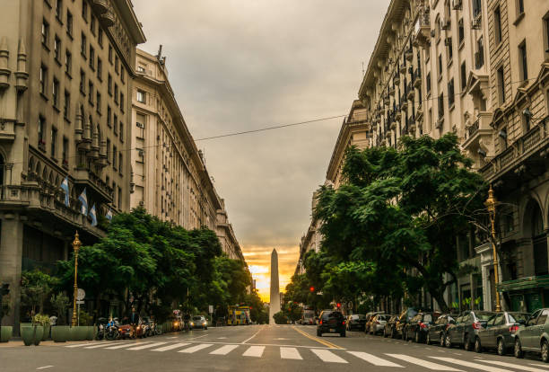 Sunset view at the Obelisk and classic architecture buildings in the center of Buenos Aires stock photo