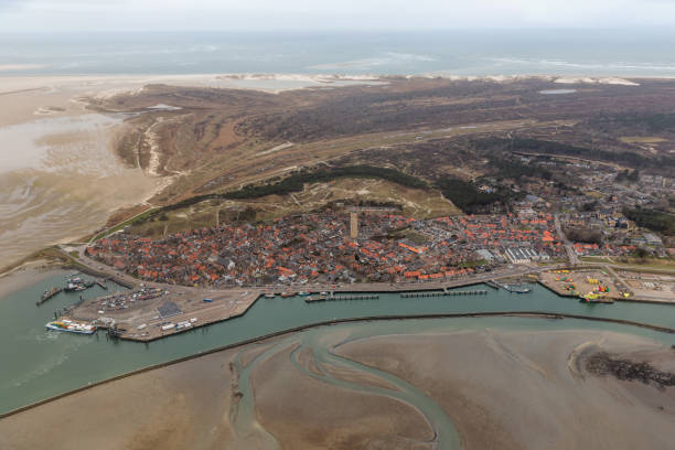 istock Aerial view Dutch harbor and Village Terschelling 1153479047