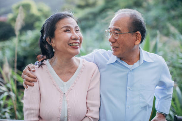 istock Senior couple standing on balcony at home 1153482499