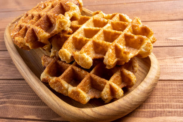 istock waffle on a plate on the wooden table 1153488213