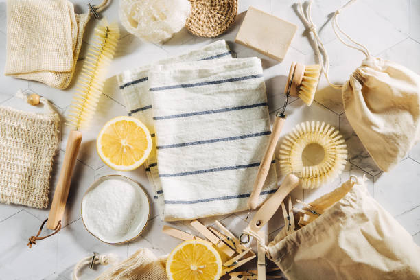 Natural cleaning products lemon and baking soda with bamboo dish brushs. Eco friendly. Zero waste concept. Plastic free.