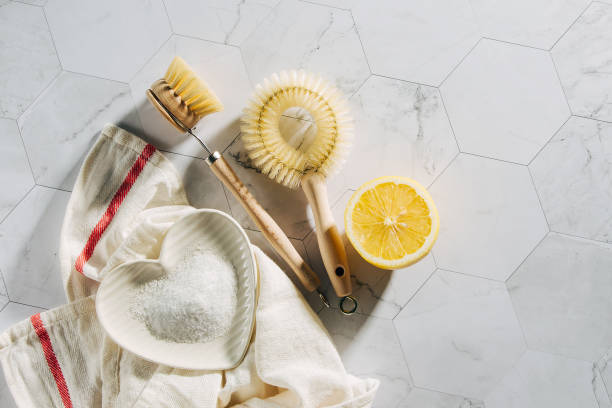 istock Natural cleaning products lemon and baking soda with bamboo dish brushs. Eco friendly. Zero waste concept. Plastic free. 1153488619