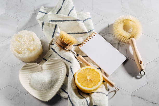 istock Natural cleaning products lemon, bamboo dish brushs with notebook. Eco friendly. Zero waste concept. Plastic free. 1153488679