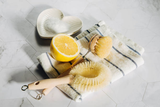 istock Eco friendly natural cleaning tools and products, bamboo dish brushes and lemon with baking soda. Zero waste concept. Plastic free. 1153489217