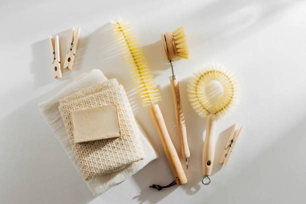 istock Zero waste, compostable cleaning tools. Wooden dish brush and clothespins. Eco friendly concept. 1153489350