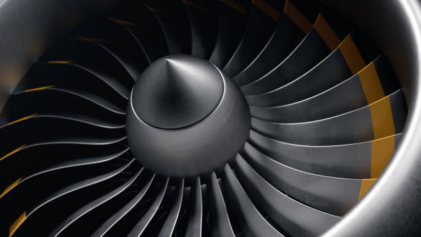 istock 3D illustration jet engine, close-up view jet engine blades. Front view of a jet engine blades. Rotating blades of the turbojet. Part of the airplane. Blades at the ends painted orange 1153489381