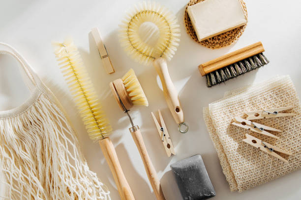 istock Zero waste, compostable cleaning tools. Wooden dish brush, clothespins, soap and mesh market bag . Eco friendly concept. 1153489398