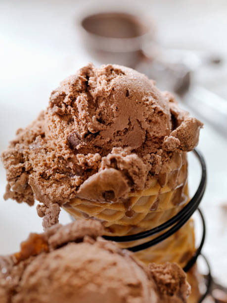 istock Double Chocolate Chunk Ice Cream in a Waffle Cone 1153495220