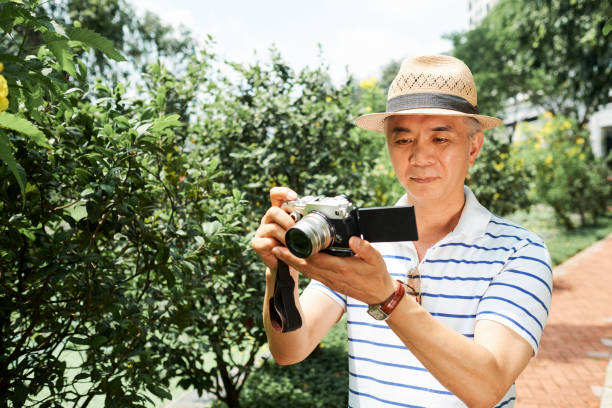 istock Man photographing the nature 1153498533