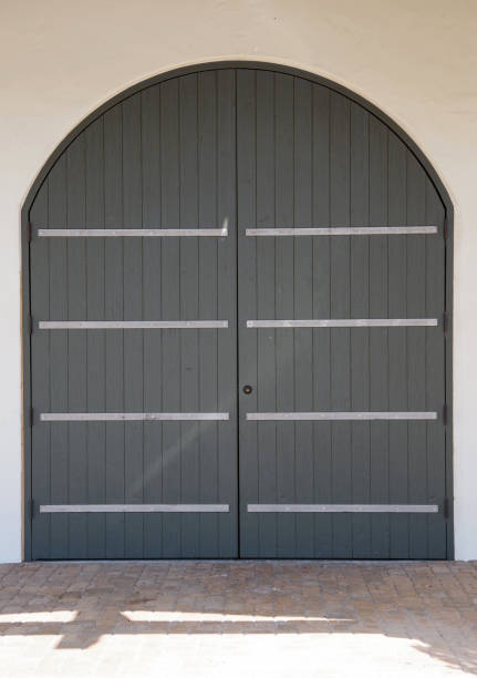 istock Big arched wooden doors 1153502960