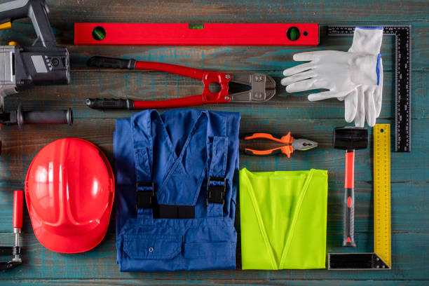 istock Top view of construction instruments on rustic wood bench 1153503832