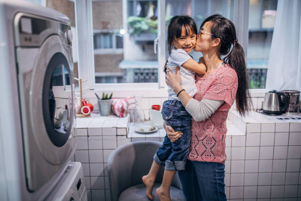 istock Mother and daughter embracing 1153504455