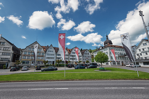 Gais, Switzerland - May 30, 2019: This is the village centre of the village Gais in the middle of the Appenzellerland in Switzerland. The village is decorated with flags of the canton Appenzell Ausserrhoden and Switzerland because of the festivities for the ascent.