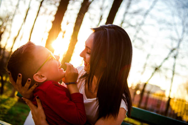 istock Mother and son are playing in the park 1153510048