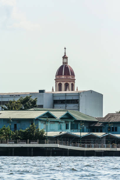 Structure elements of Wat Arun Temple on background of blue sky.
