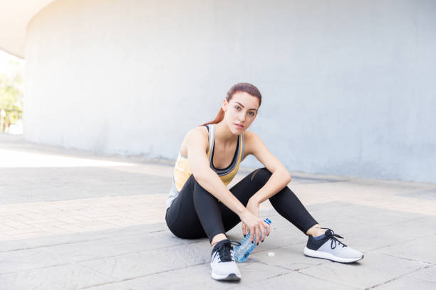 istock Woman Looking Tired After Workout 1153514328