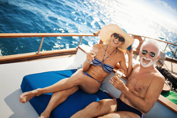 istock Senior couple on a sailing cruise. 1153516874
