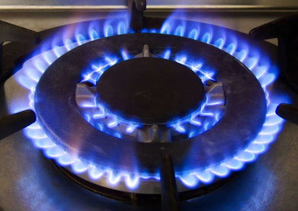 istock Blue fire from domestic kitchen stove, gas burning flames 1153517114