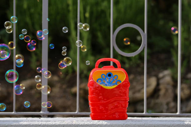 Soap bubble in the air from bubble machine stock photo