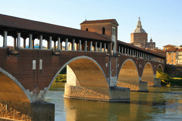 covered bridge, ticino and dome of the cathedral of pavia - europe arch bridge stone bridge covered bridge imagens e fotografias de stock