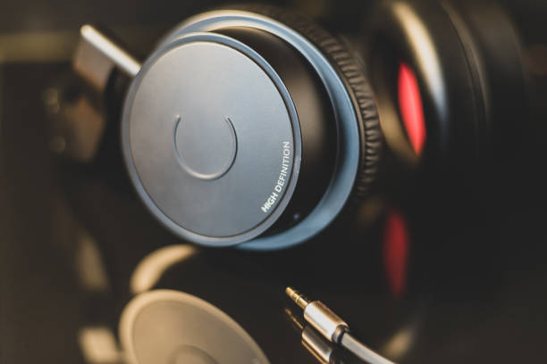 istock High definition earphone with nice reflection in focus. Isolated concept for music and technology 1153521523