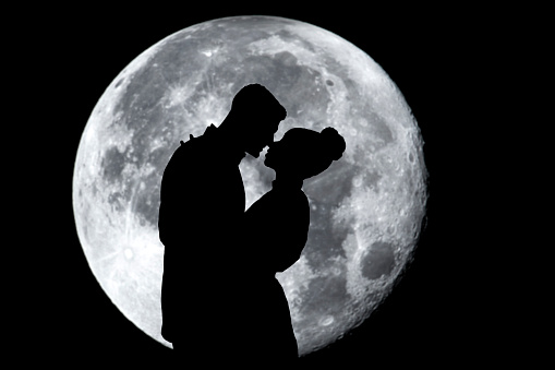 A man proposing by moonlight