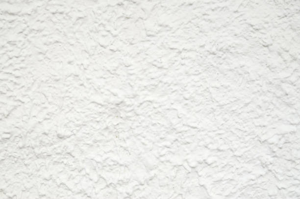 istock New white painted old plaster on wall closeup 1153526037