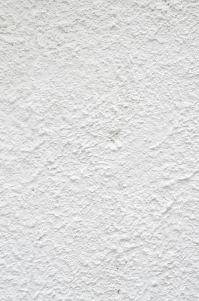 istock New white painted old plaster on wall closeup 1153526059