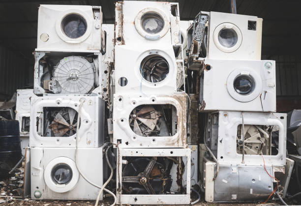 istock Electronics Washing machine waste old, used and obsolete electronic equipment for recycle in factory industry 1153527308