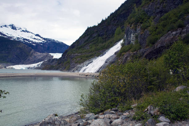 istock Nugget fall at mendenhall glacier in Juneao Alaska a summer day 1153528151