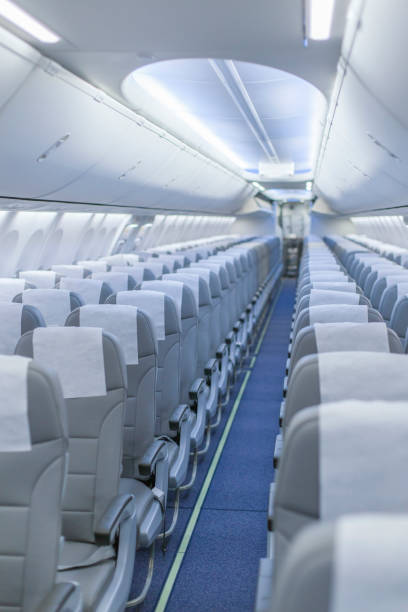 istock Perspective view of empty aircraft seats and lights 1153529359