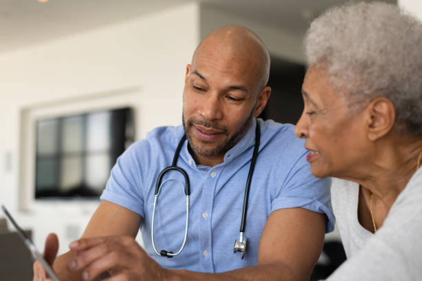 istock Doctor showing his patient their results 1153537010