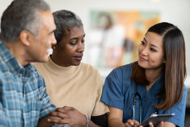 istock Sharing results with an elderly couple 1153537050