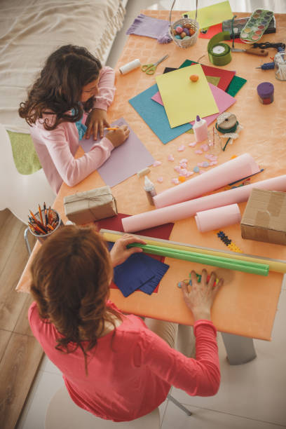 istock Mother and daughter being creative 1153537072