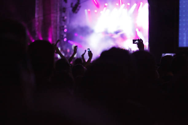 istock People at concert party 1153537341